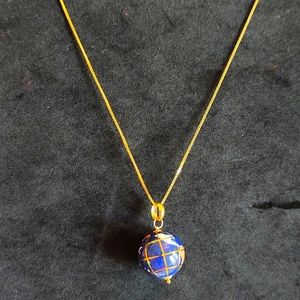 14k Gold and Gemstone pendant and chain.